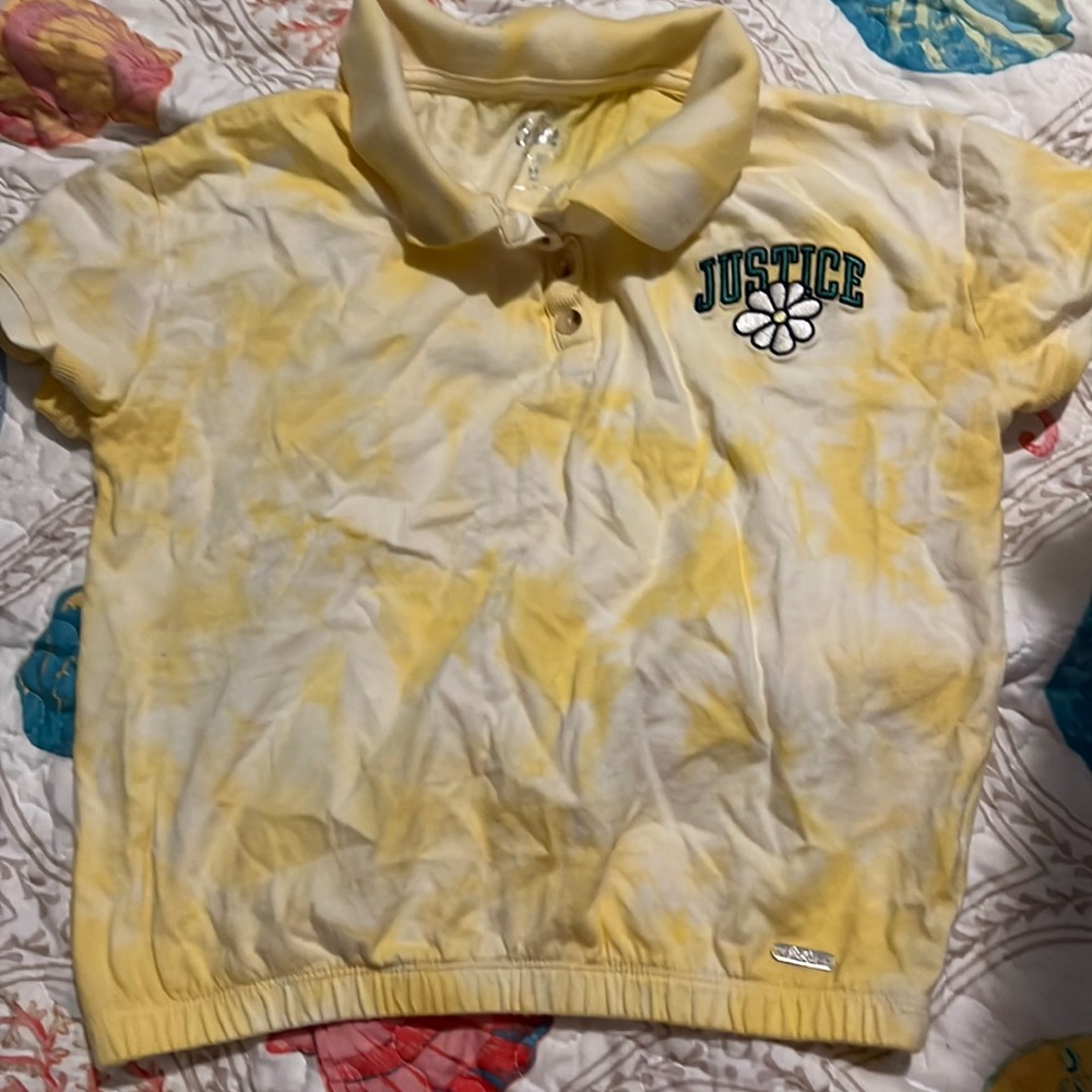 Justice yellow polo with a flower